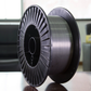 Angled view of magnesium-aluminum welding wire spool